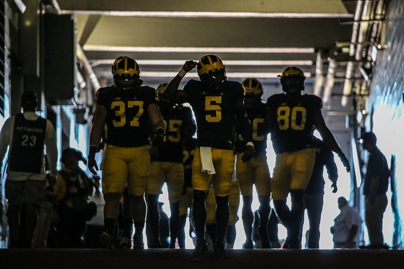 Jabrill Peppers leads players down the tunnel during warmups.