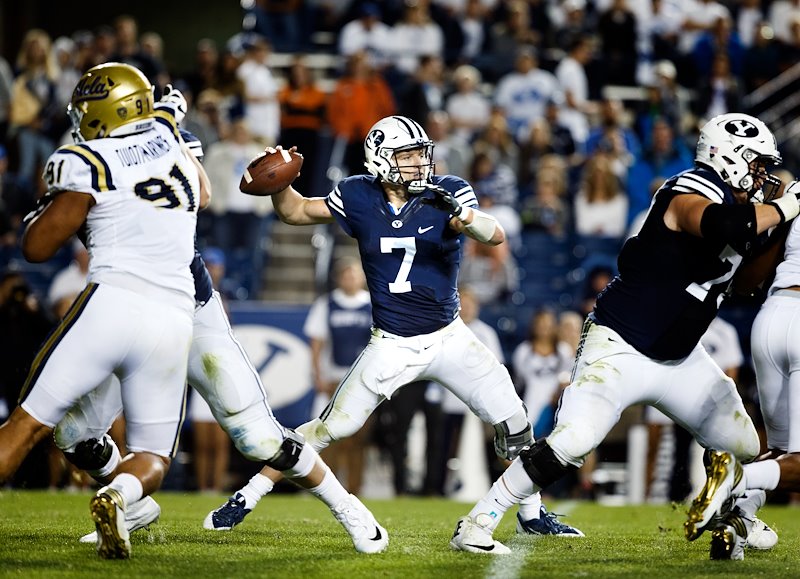 Taysom Hill throws the ball during the game against UCLA - Photo by Meagan Larsen/BYU