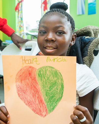 We asked kids to draw hearts to symbolize love. Patricia's heart drawing is beautiful, just like her!