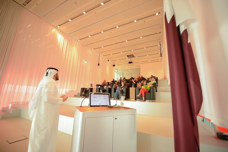 The Richmond delegation listens to a presentation about Qatar Foundation at its headquarters in Education City.