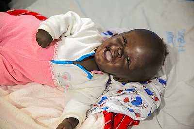 A happy baby at CURE Uganda!