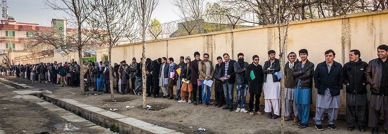 Passport applicants have been waiting in a long queue since the dusk to get a passport. © UNDP Afghanistan / S. Omer Sadaat / 2016