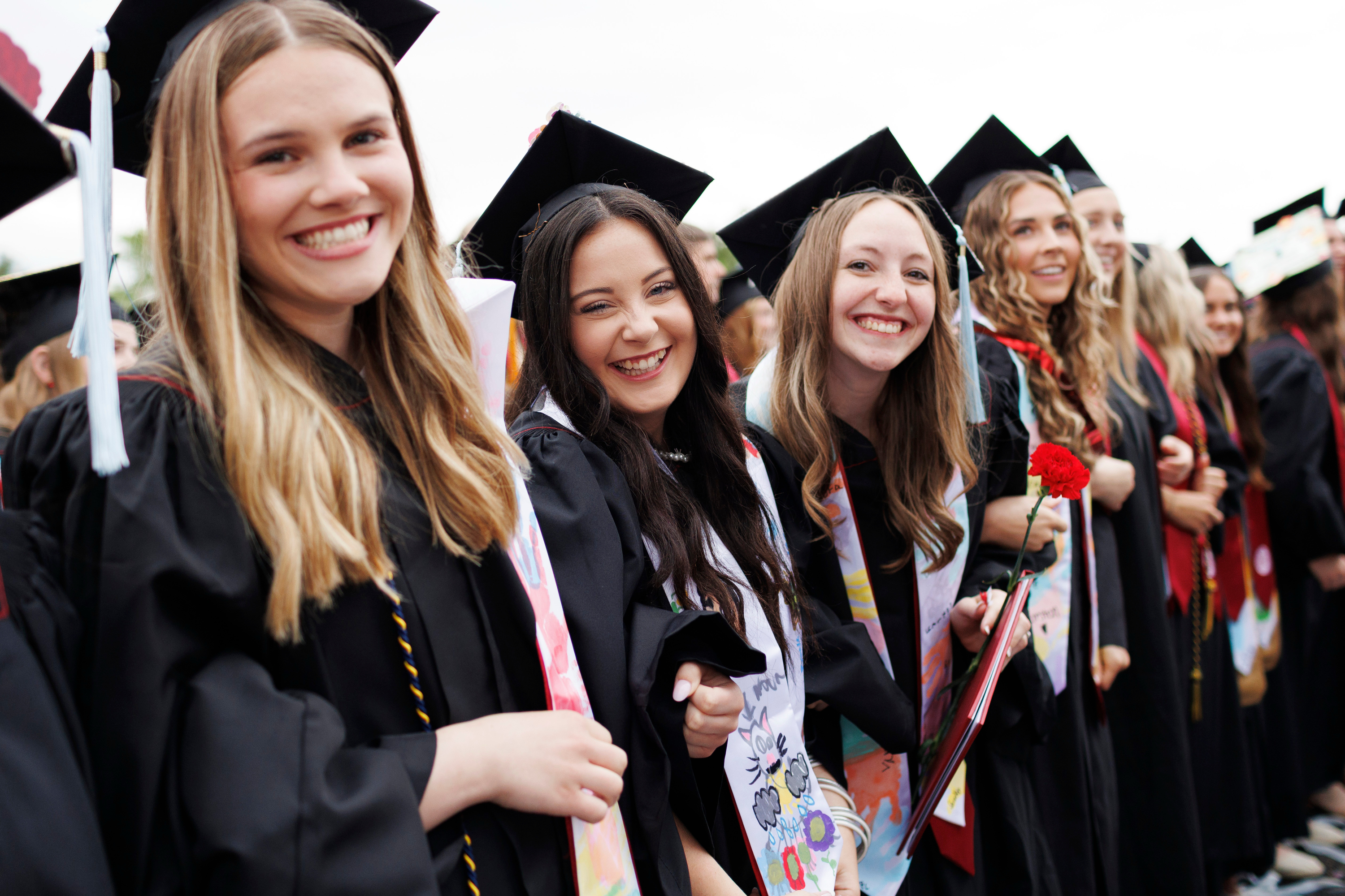 Graduates pose for a photo during the IU East Commencement in Richmond ...