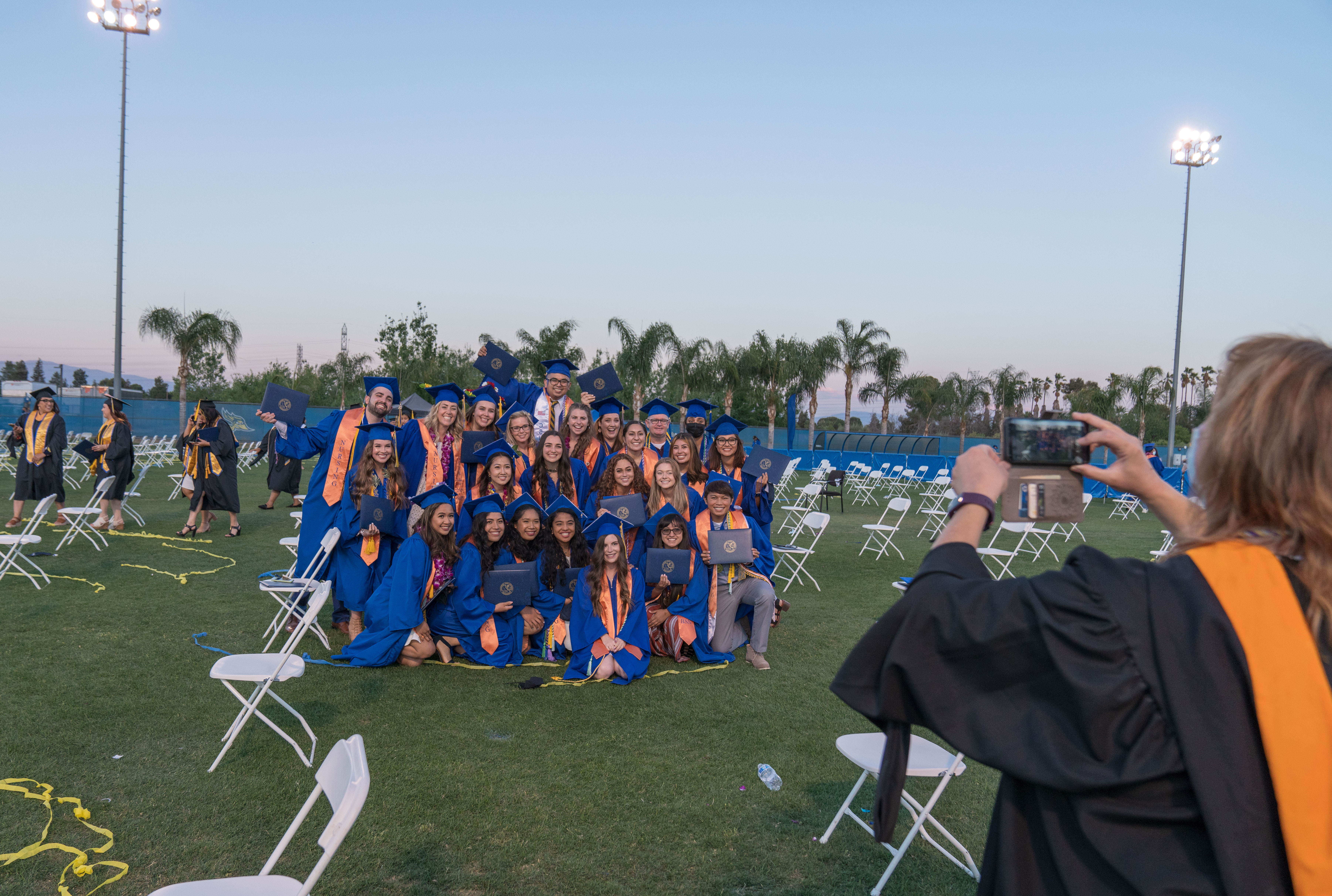 Nursing students take a group photo after their spring 2021 graduation ...