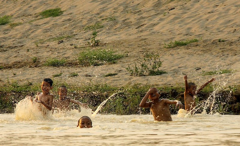 Children playing in the Chindwin River near Monywa township.