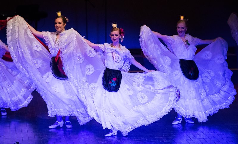 Amanda Alley, Rebecca Kiser, and Victoria Ringer dance during a concert at the Vietnam Dance Academy. Photo by Jaren Wilkey/BYU