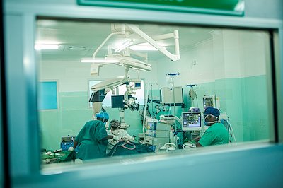 Dr. Felicidad operating on a cleft lip patient.