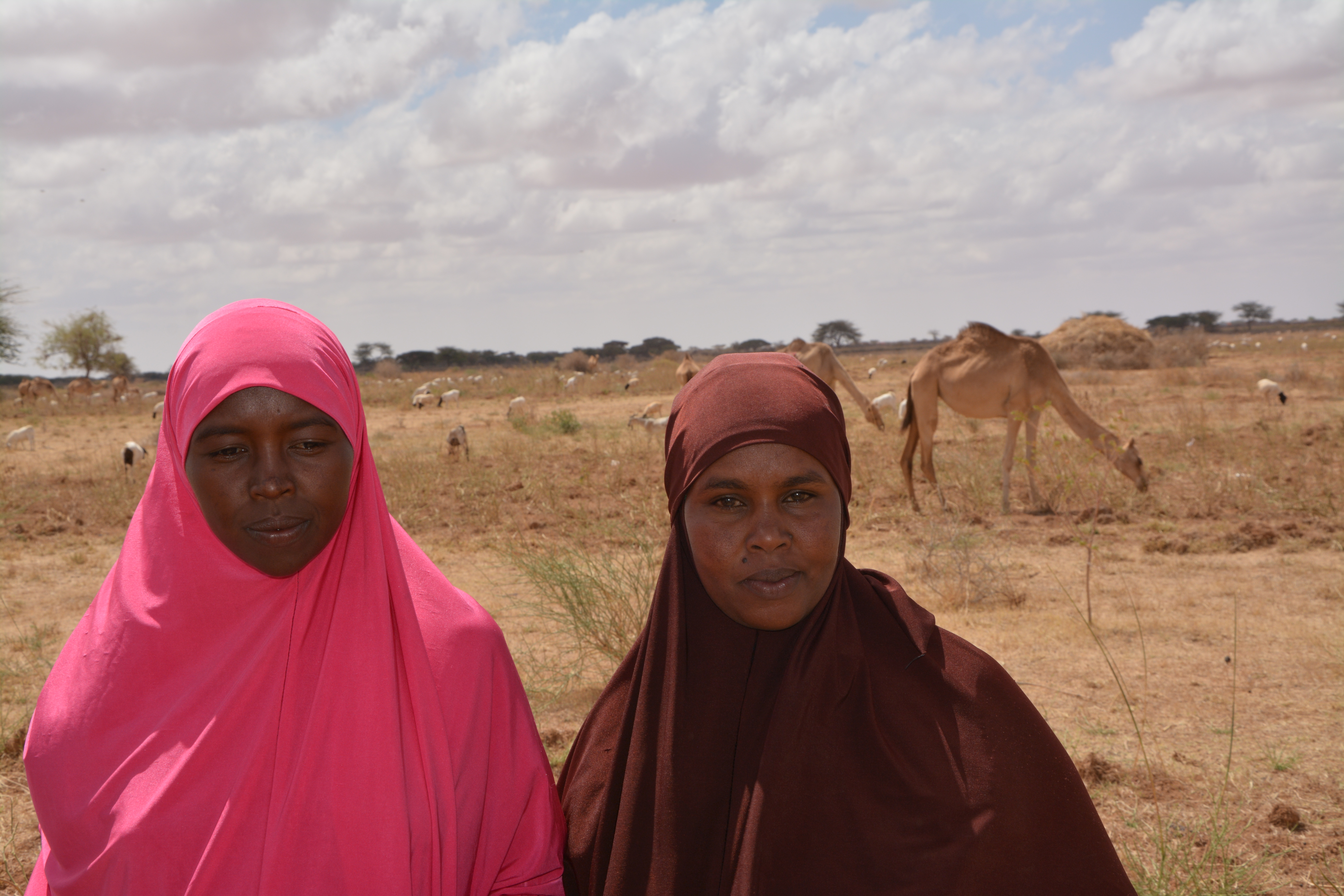 Farmer Deqa Ahmed Jama with a relative