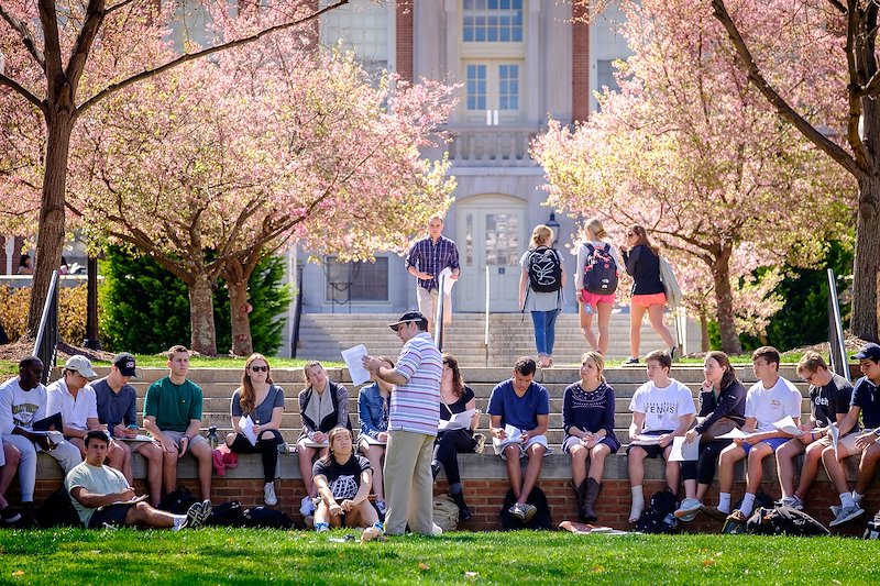 Wake Forest philosophy professor Tyron Goldschmidt takes his Philosophy of Religion class outside on Manchester Plaza.