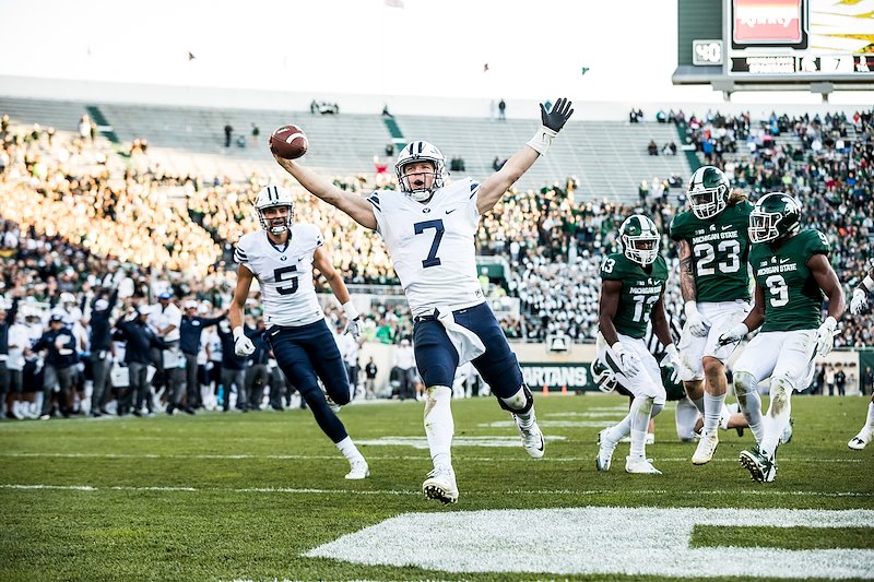 Taysom Hill scores touchdown during the game against Michigan State - Photo by Jaren Wilkey/BYU