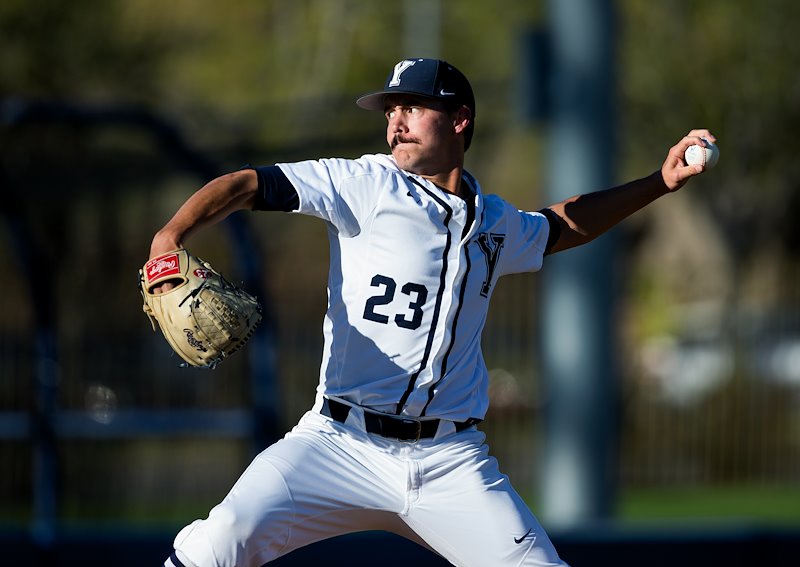 Hayden Rogers pitches the ball against the University of Utah - Photo by Jaren Wilkey/BYU
