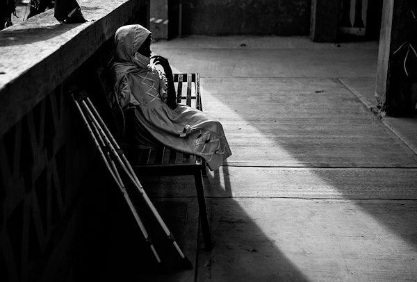 Laila listens to our spiritual team preach while she waits for her appointment.