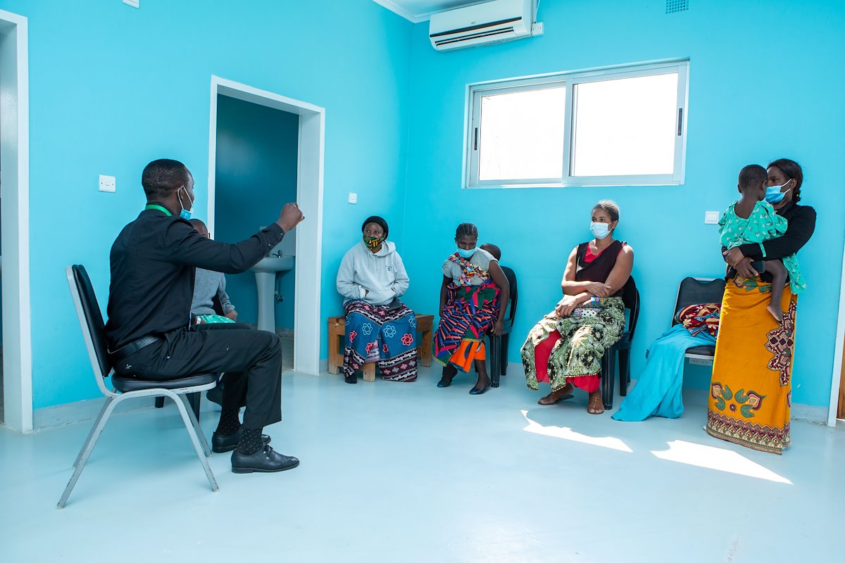 Pastor Terence ministers to the patients and parents as they wait.