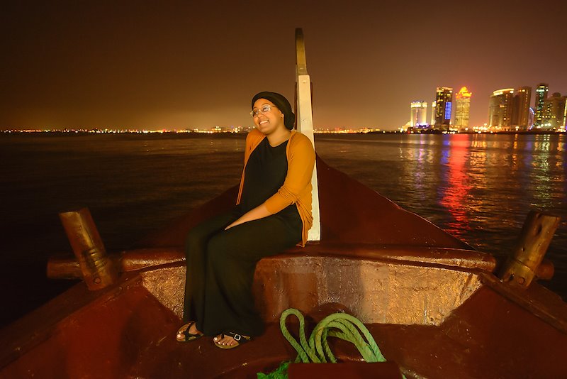 Richmond student Hanan Kourtu enjoys a dhow cruise in the Arabian Gulf.
