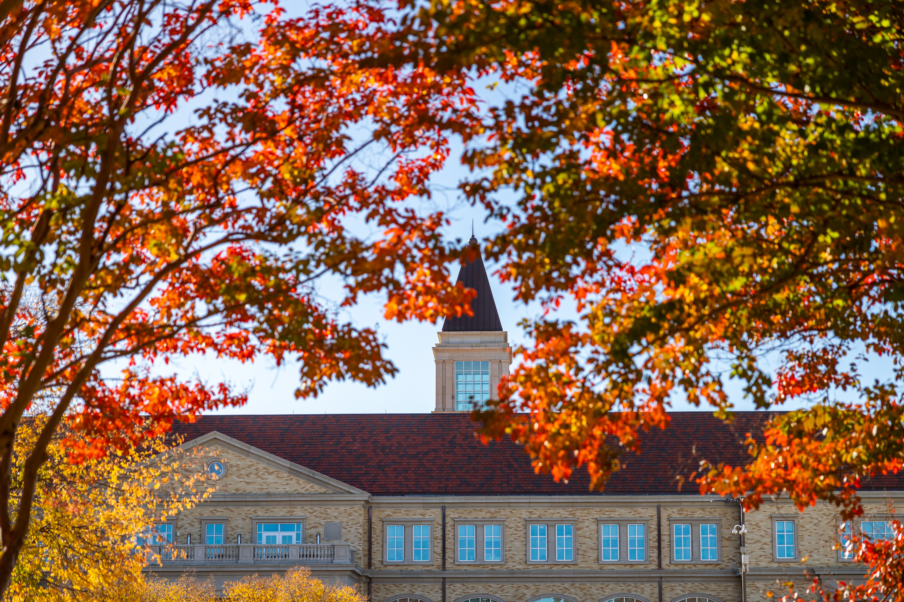 A tower rises over the entrance of The Harrison, TCU’s main ...
