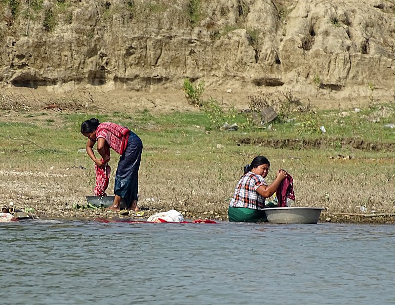 Women washing clothes near Homalin township.
