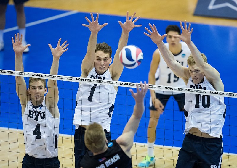 Leo Durkin, Price Jarman, and Jake Langlois block at hit by Long Beach State in the NCAA Championships - Photo by Jaren Wilkey/BYU