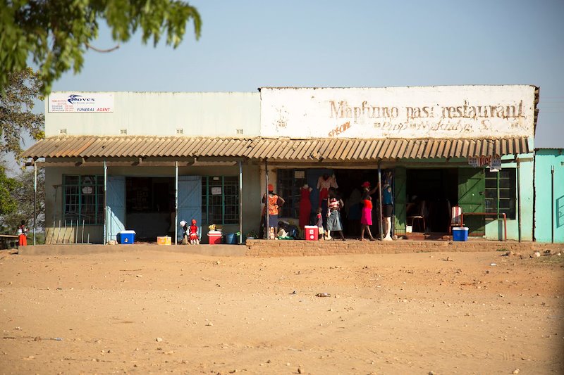 Stores line the street in front of St Albert’s Mission Hospital in Bindura.