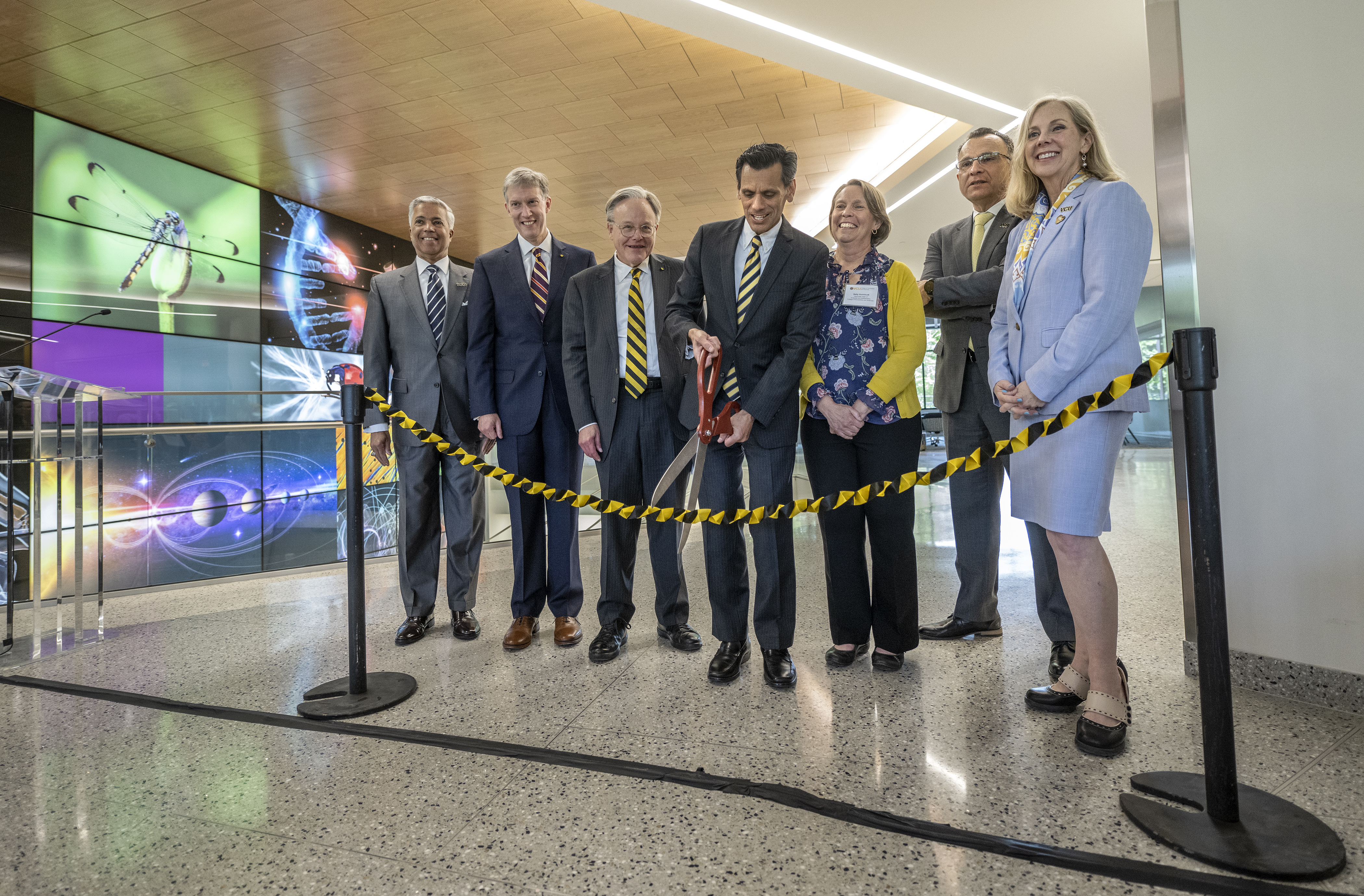 VCU officials cut the ribbon at the new STEM building.
