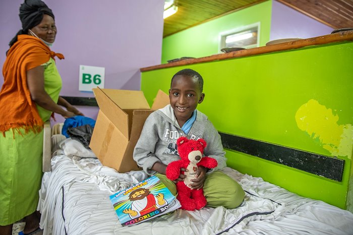 Twalib received a CURE care package plus other goodies and he was super excited to show us.