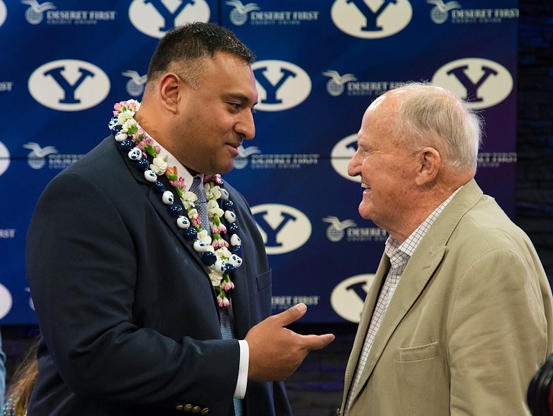 LaVell talks with newly announced head coach Kalani Sitake in December of 2015.