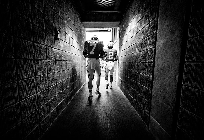 Micah Hannemann and Matt Hadley walk onto the field to play against the University of Utah - Photo by Jaren Wilkey/BYU