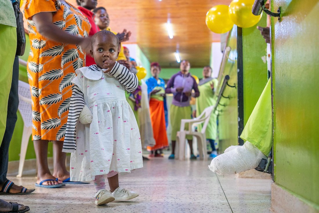 This cute little girl couldn't wait to have some cake during our Christmas celebration with the patients in the ward.
