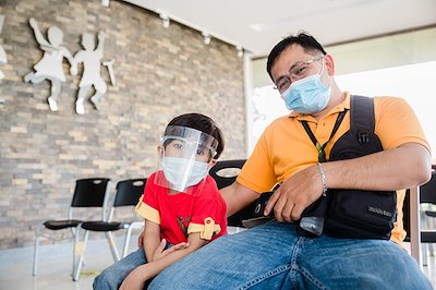 One of our field workers, Marvin, brought his "mini-me" with him during clinic.