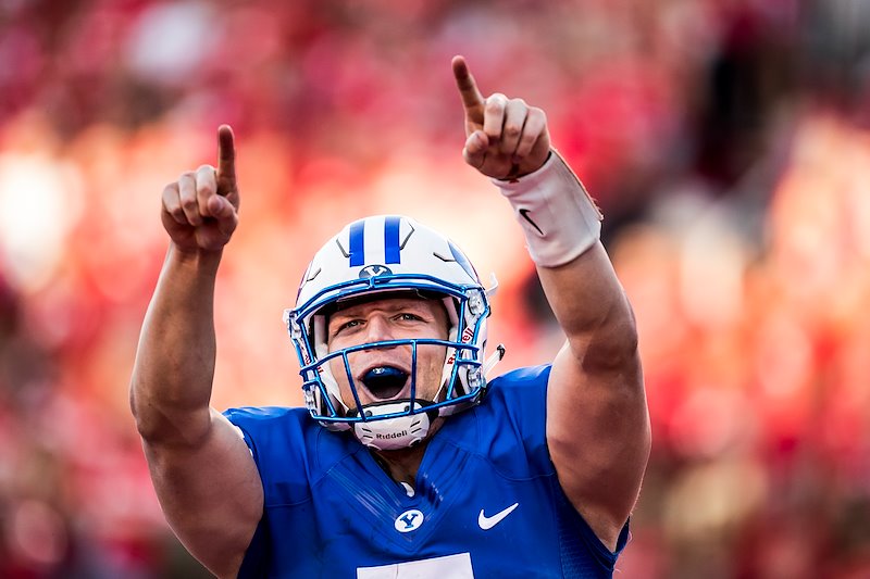 Taysom Hill celebrates a touchdown during the game against the University of Utah - Photo by Jaren Wilkey/BYU