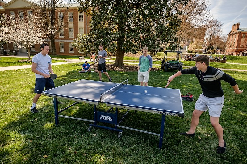 Cam David ('19), left, and Alex Moffe ('19) play table tennis on the Mag Quad.