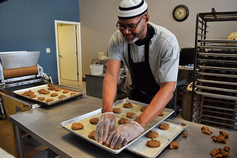 Local entrepreneur Bilal Sabir of Delightful Foods preparing a batch of his “No Cookie” cookies