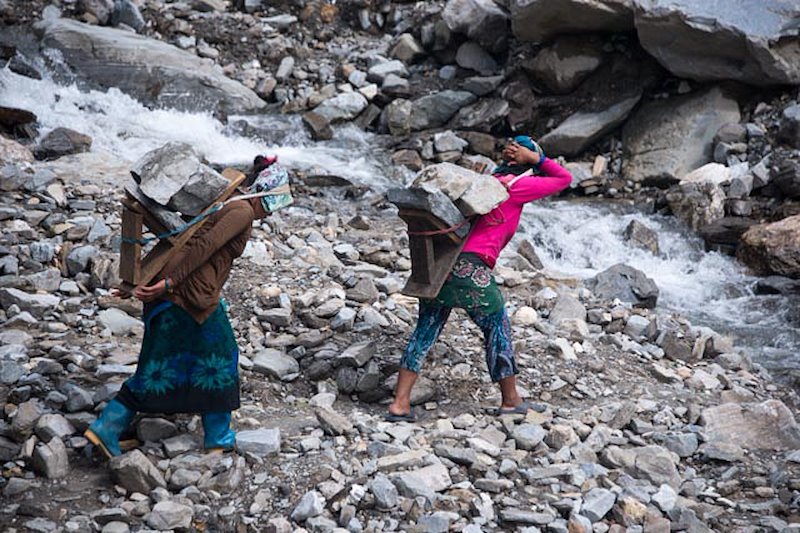 Work exchange plus rocks from a new landslide in Gorkha District allow locals to rebuild without much outside aid.