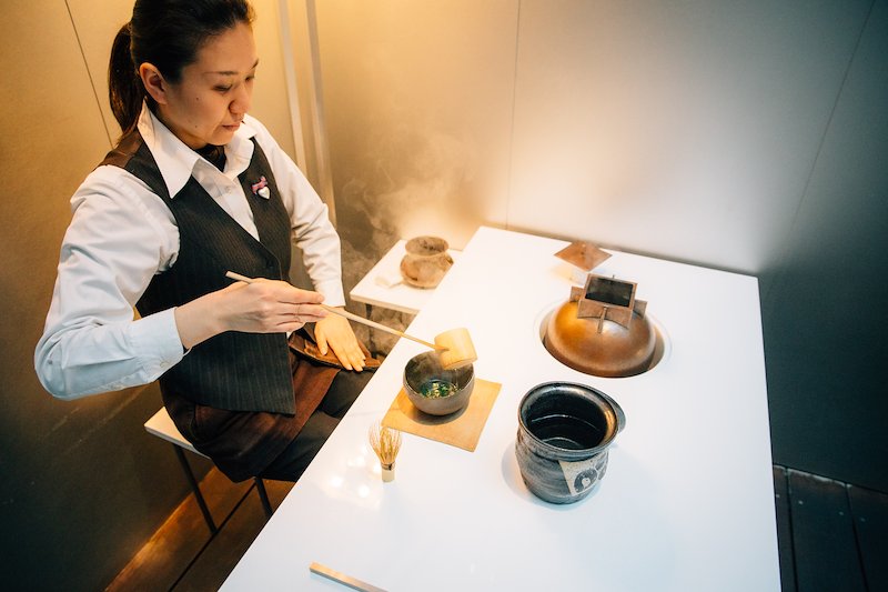 Matcha being freshly prepared. Elements from traditional tea ceremony are carried into this modern tea service