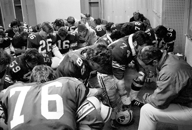 The team praying together before the game.