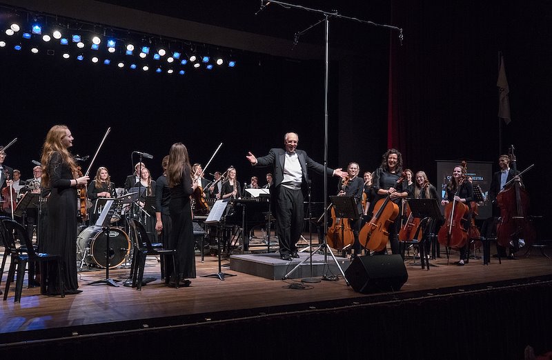 Kory Katseanes and the BYU Chamber Orchestra take their final bow after their concert with Tim Pavino. Photo by Jaren Wilkey/BYU