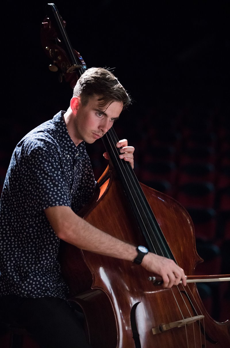BYU Chamber Orchestra member Christian Hales playing the bass. Photo by Jaren Wilkey/BYU