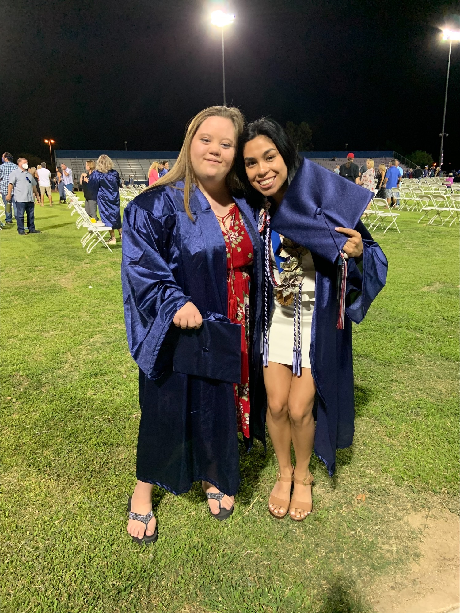 Emily Rodriguez is shown during high school graduation with a fellow ...