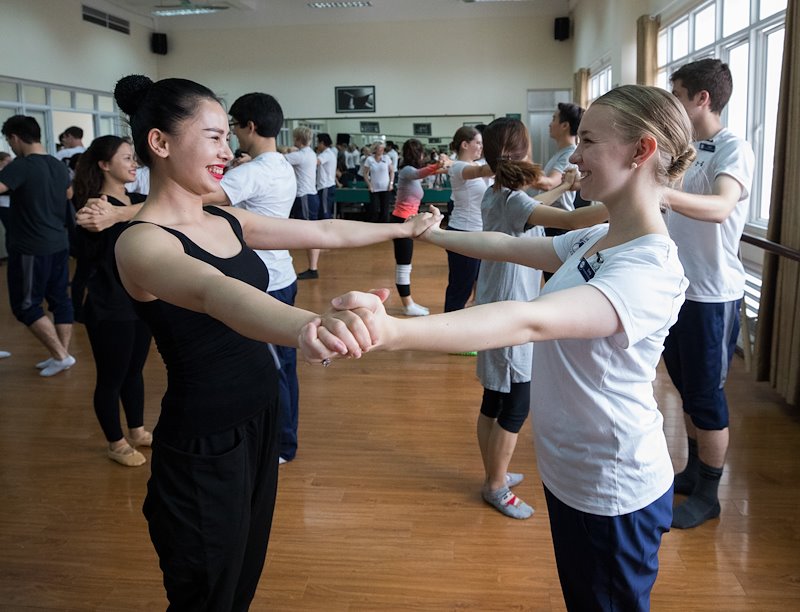 Emily Allen instructs a dancer at the Hanoi Academy of Theatre &amp; Cinema. Photo by Jaren Wilkey/BYU