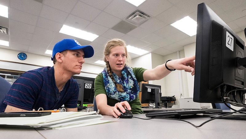 Hayden Schappell and Annie Nelson work on their water resources project before presenting it to INDRHI. Photo by Jaren Wilkey/BYU