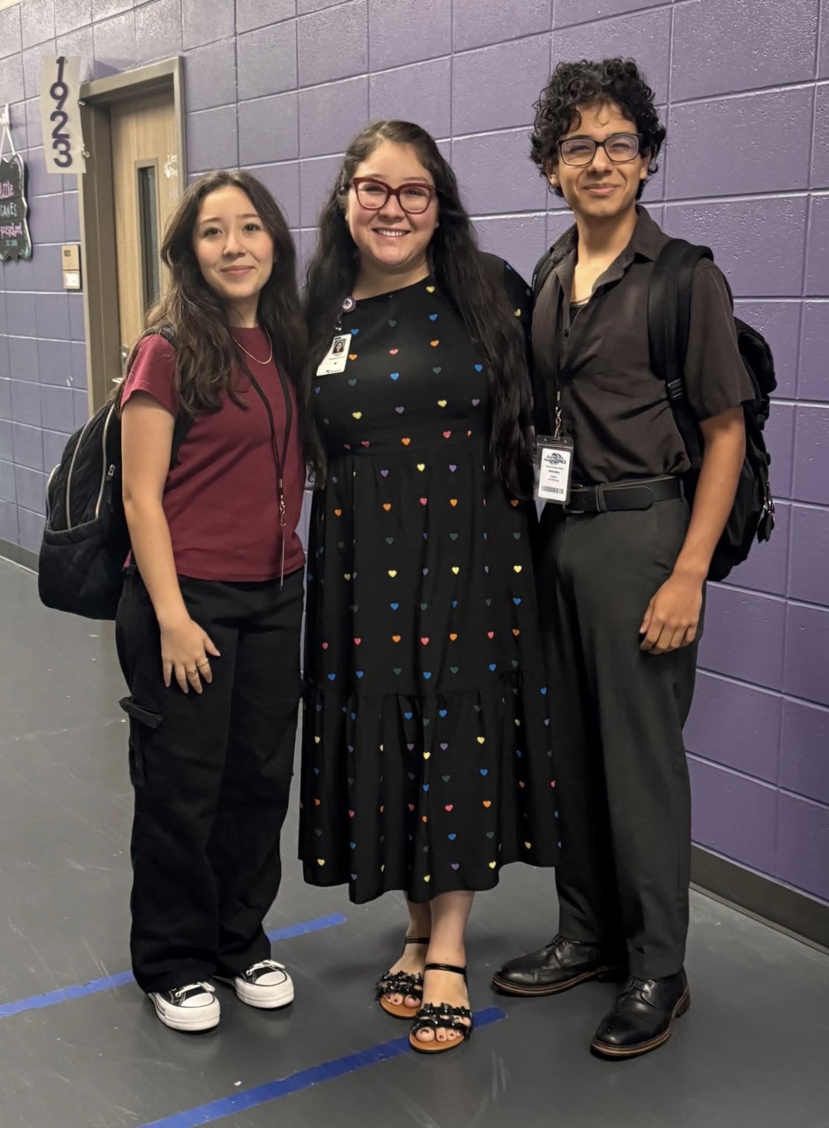 Ms. Estrada-Ponce, her sister Isabel, and brother Alex.