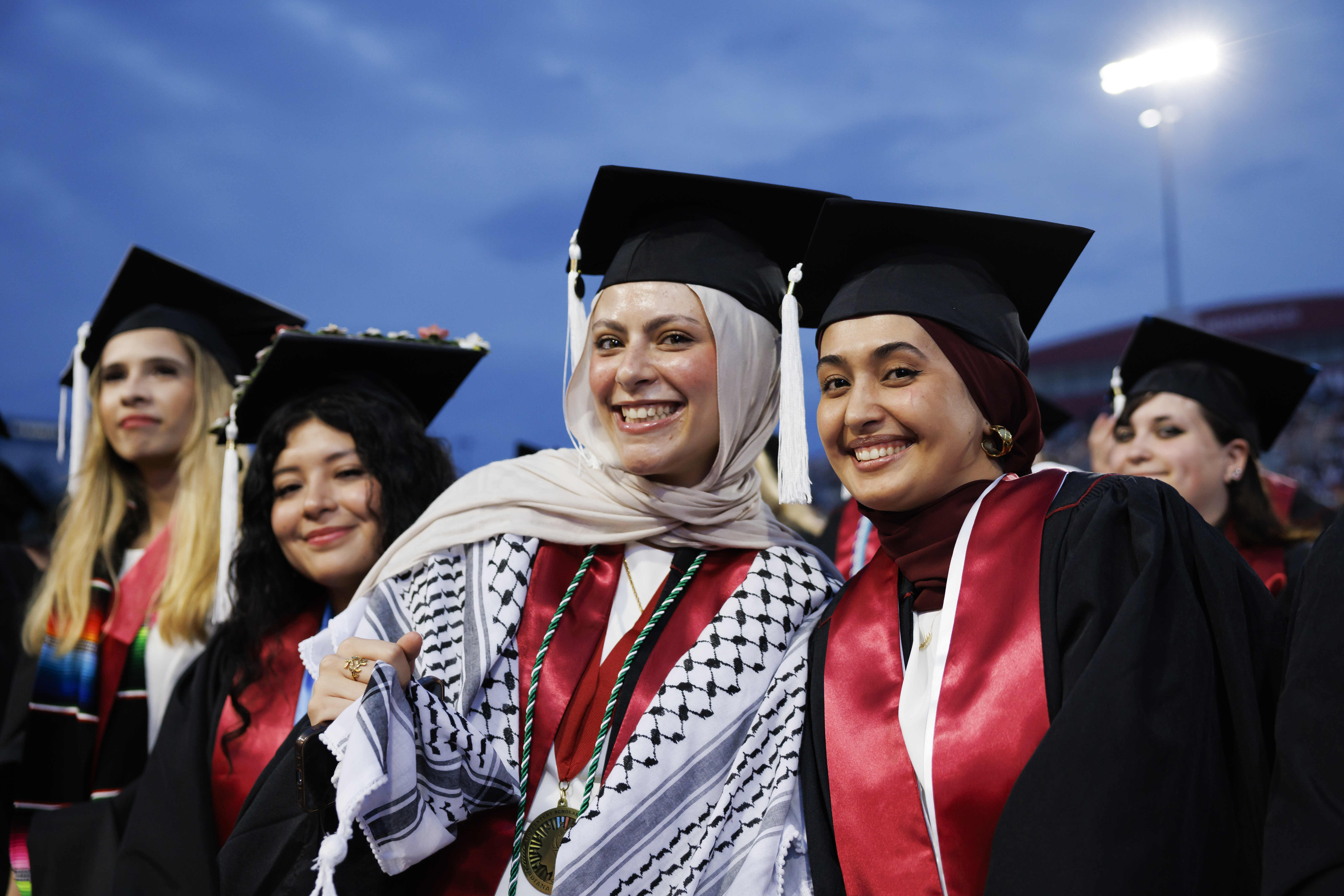 Graduates pose for a photo during the IU Indianapolis Commencement in ...