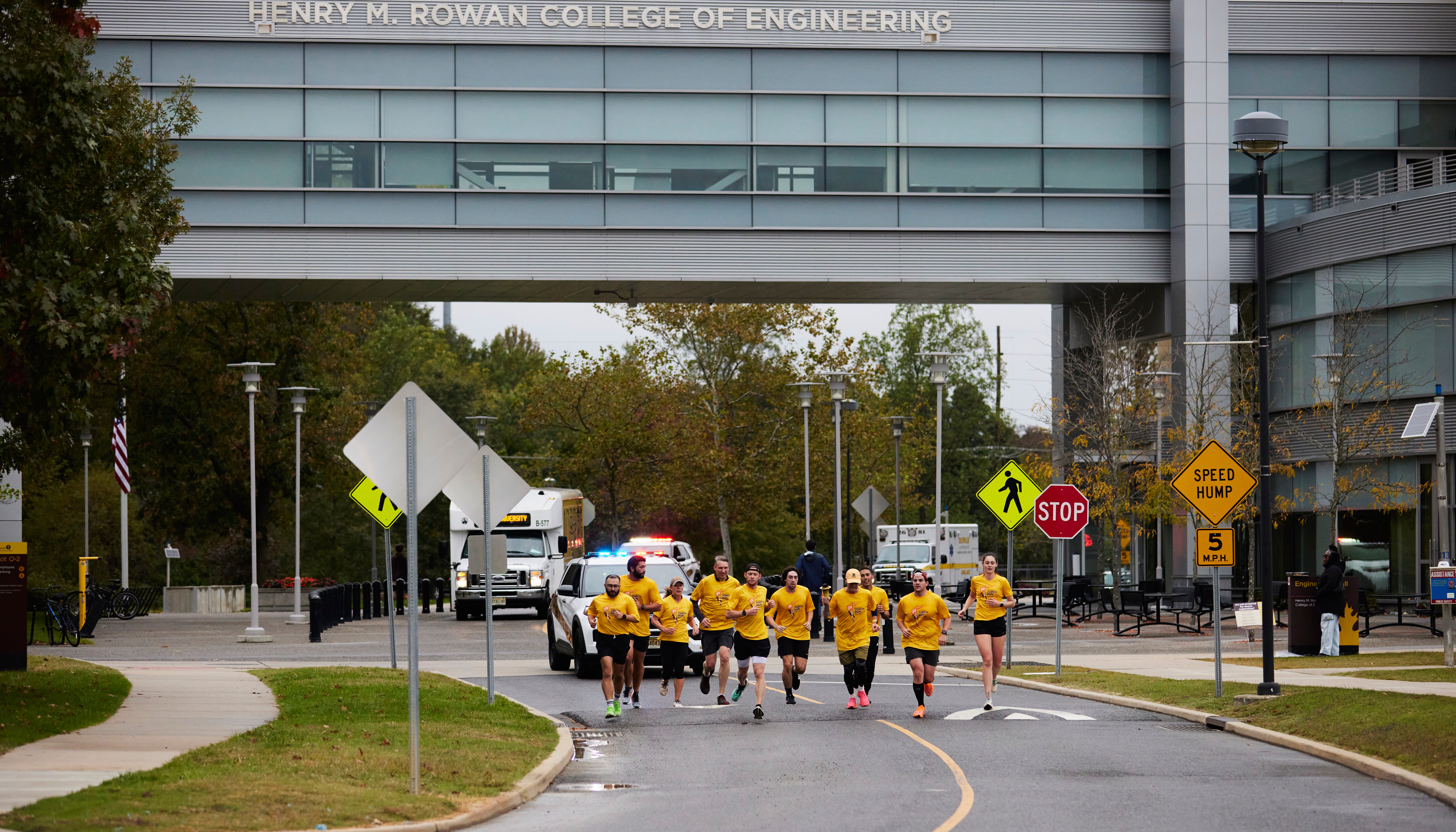 Read 1 torch. 11 runners. 26.6 miles. 100 years of history. by Lori Marshall