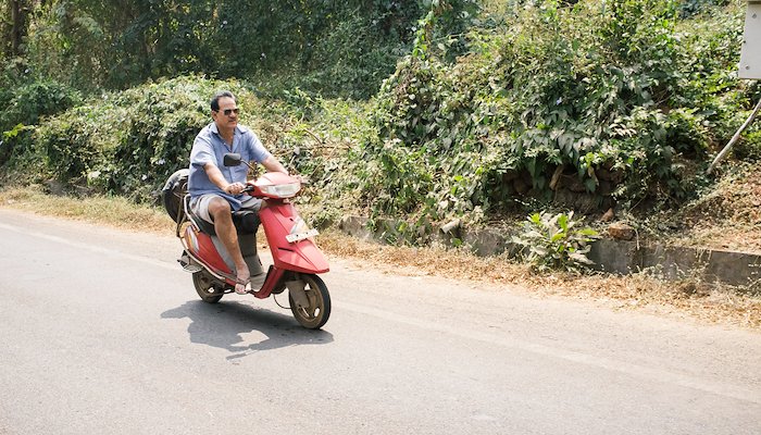Read People on motorbikes in Goa by Mark Sherratt