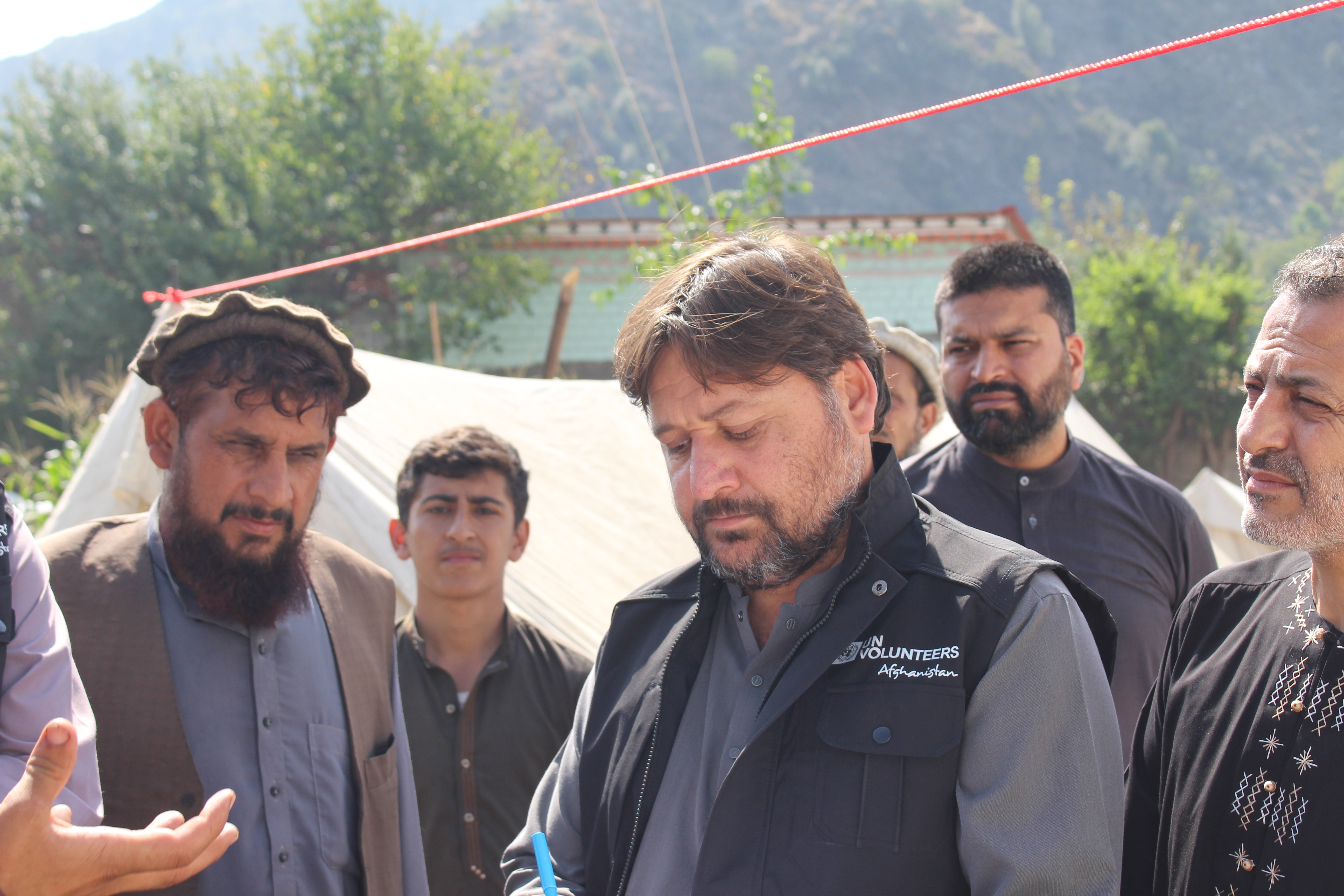 Cover photo of UN Volunteers in Afghanistan’s post-earthquake recovery by UN Volunteers